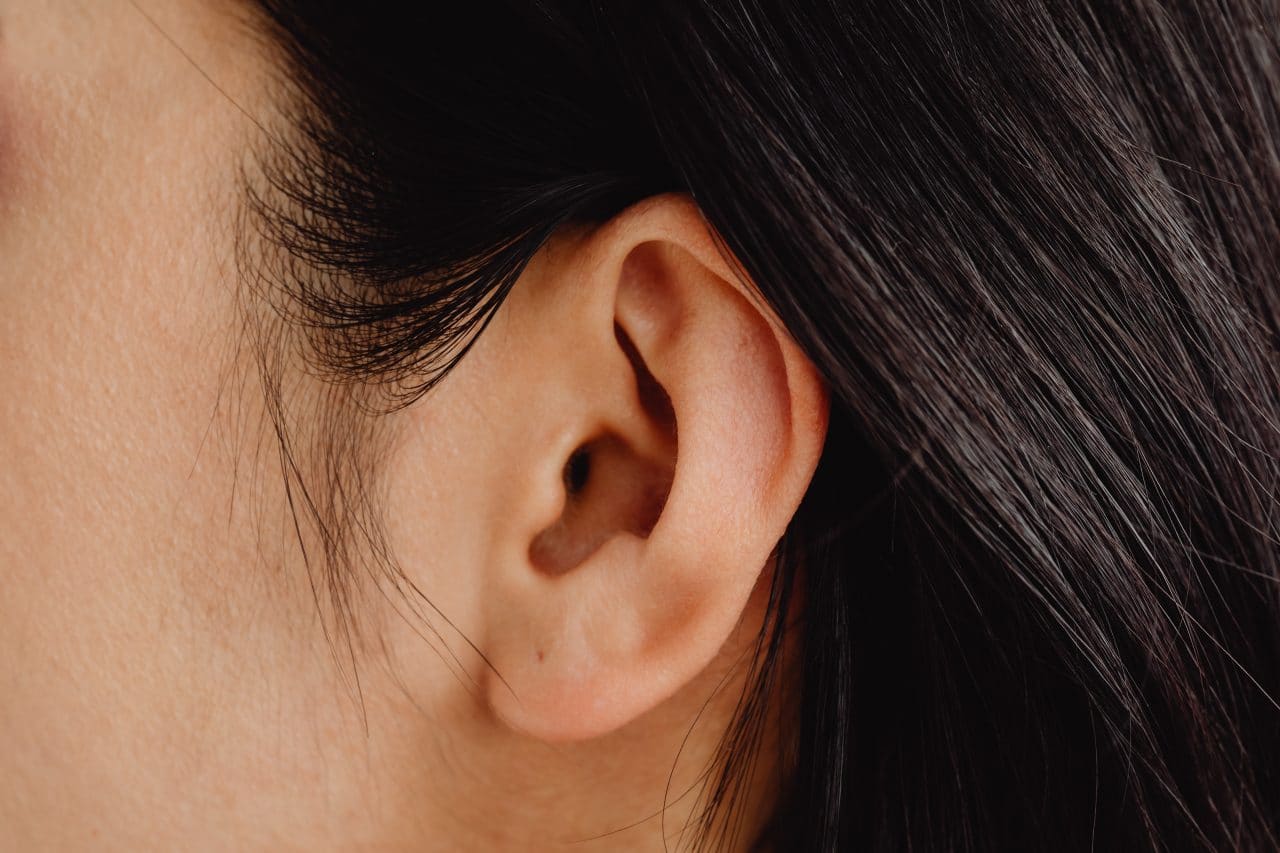 Close up of woman's ear.