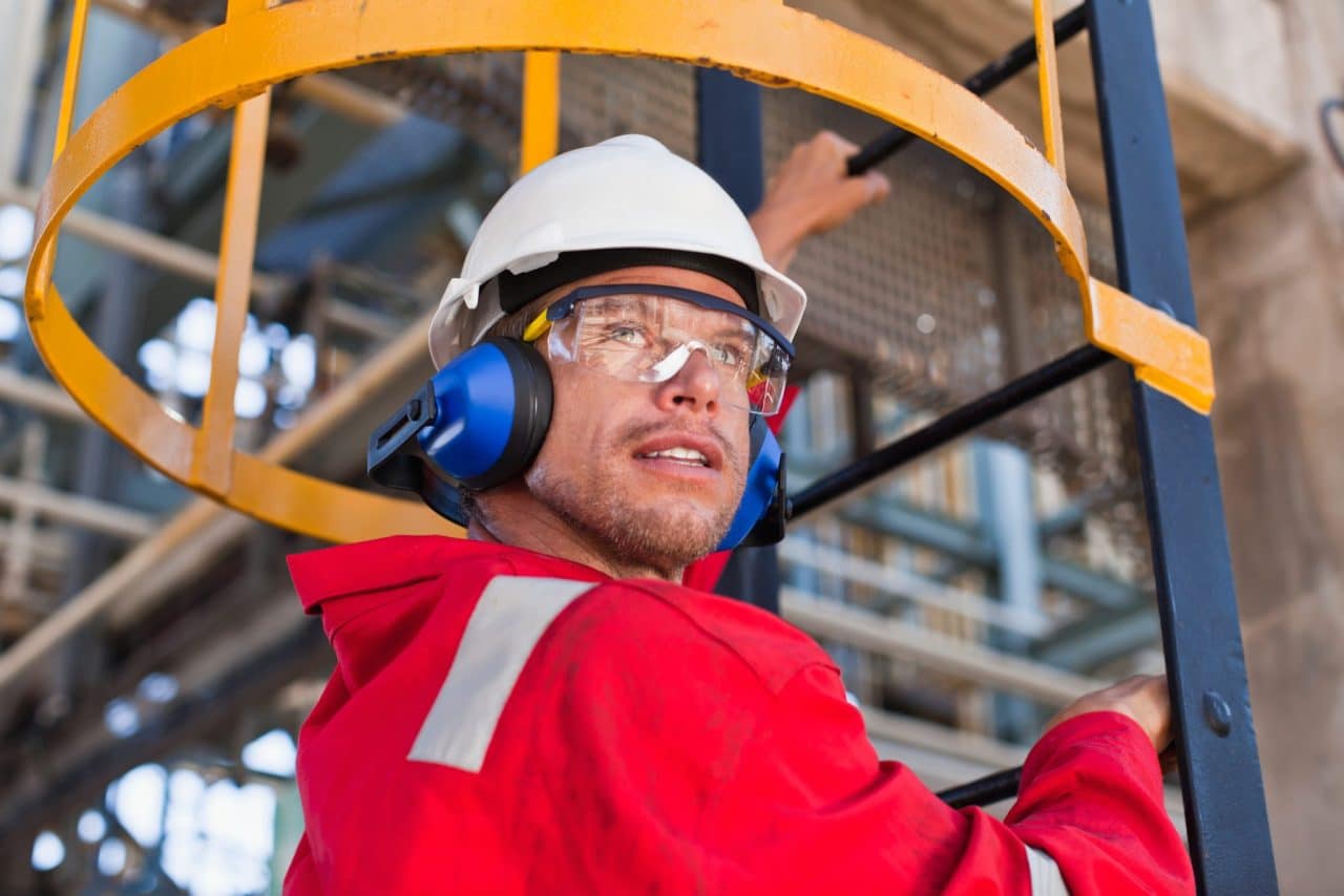 A man wearing hearing protection on the job.