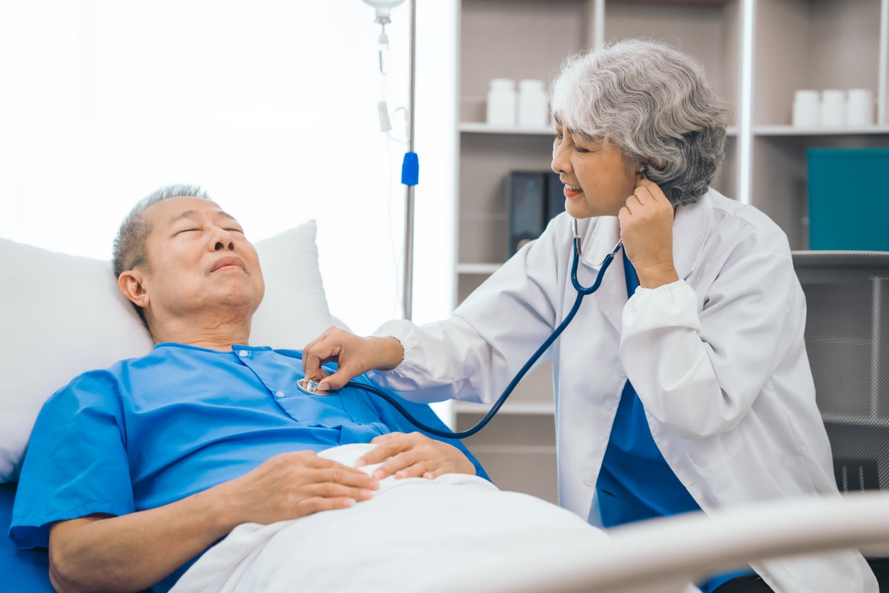 Man checked by doctor at hospital